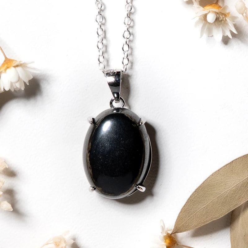 Pendentif oval Hématite – Protection et Stabilité